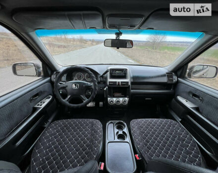 Бежевый Хонда СРВ, объемом двигателя 2 л и пробегом 290 тыс. км за 7788 $, фото 102 на Automoto.ua