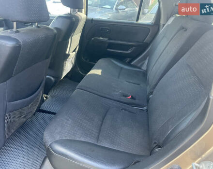 Бежевий Хонда СРВ, об'ємом двигуна 2 л та пробігом 270 тис. км за 7200 $, фото 8 на Automoto.ua