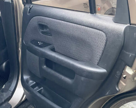 Бежевий Хонда СРВ, об'ємом двигуна 2 л та пробігом 209 тис. км за 6000 $, фото 34 на Automoto.ua