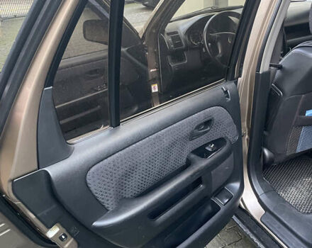 Бежевий Хонда СРВ, об'ємом двигуна 2 л та пробігом 209 тис. км за 6000 $, фото 23 на Automoto.ua