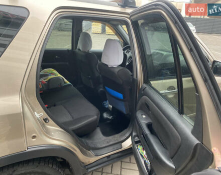 Бежевый Хонда СРВ, объемом двигателя 2 л и пробегом 320 тыс. км за 8000 $, фото 6 на Automoto.ua