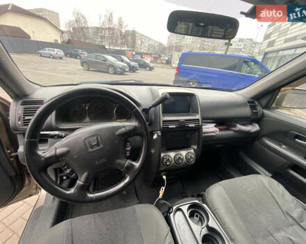 Бежевый Хонда СРВ, объемом двигателя 2 л и пробегом 320 тыс. км за 8000 $, фото 23 на Automoto.ua