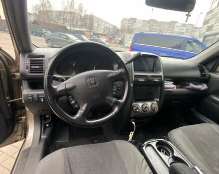 Бежевый Хонда СРВ, объемом двигателя 2 л и пробегом 320 тыс. км за 8000 $, фото 24 на Automoto.ua