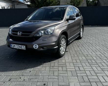 Бежевый Хонда СРВ, объемом двигателя 2 л и пробегом 132 тыс. км за 6300 $, фото 1 на Automoto.ua