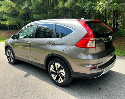 Бежевый Хонда СРВ, объемом двигателя 2.4 л и пробегом 74 тыс. км за 3600 $, фото 5 на Automoto.ua