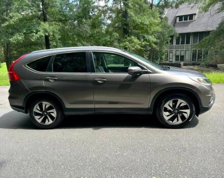 Бежевый Хонда СРВ, объемом двигателя 2.4 л и пробегом 74 тыс. км за 3600 $, фото 6 на Automoto.ua