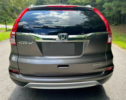 Бежевый Хонда СРВ, объемом двигателя 2.4 л и пробегом 74 тыс. км за 3600 $, фото 4 на Automoto.ua