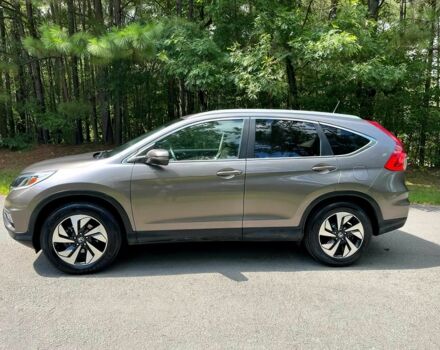 Бежевый Хонда СРВ, объемом двигателя 2.4 л и пробегом 74 тыс. км за 3600 $, фото 2 на Automoto.ua