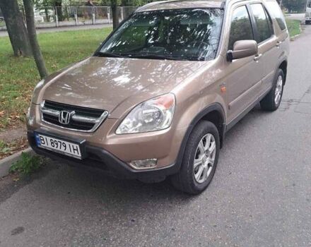 Бежевый Хонда СРВ, объемом двигателя 2 л и пробегом 255 тыс. км за 7200 $, фото 1 на Automoto.ua