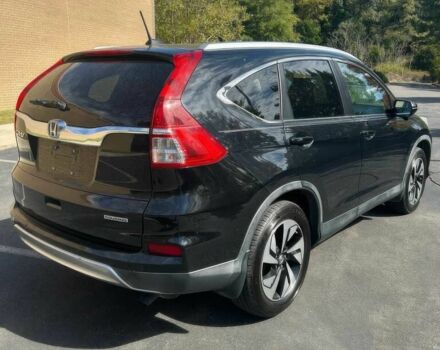 Черный Хонда СРВ, объемом двигателя 2.4 л и пробегом 70 тыс. км за 12400 $, фото 4 на Automoto.ua