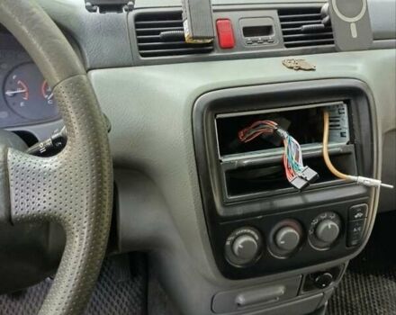 Чорний Хонда СРВ, об'ємом двигуна 2 л та пробігом 340 тис. км за 3500 $, фото 4 на Automoto.ua