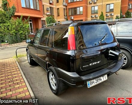 Черный Хонда СРВ, объемом двигателя 2 л и пробегом 222 тыс. км за 4000 $, фото 2 на Automoto.ua