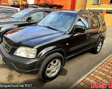 Черный Хонда СРВ, объемом двигателя 2 л и пробегом 222 тыс. км за 4000 $, фото 1 на Automoto.ua