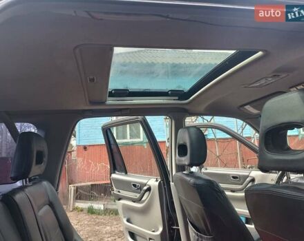 Чорний Хонда СРВ, об'ємом двигуна 2 л та пробігом 389 тис. км за 5000 $, фото 7 на Automoto.ua