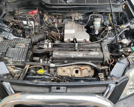 Черный Хонда СРВ, объемом двигателя 2 л и пробегом 370 тыс. км за 6500 $, фото 7 на Automoto.ua