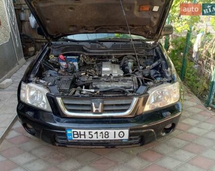 Черный Хонда СРВ, объемом двигателя 2 л и пробегом 299 тыс. км за 4999 $, фото 1 на Automoto.ua