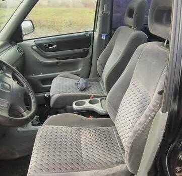 Чорний Хонда СРВ, об'ємом двигуна 2 л та пробігом 450 тис. км за 4100 $, фото 7 на Automoto.ua