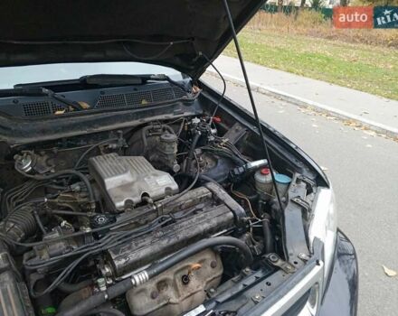 Черный Хонда СРВ, объемом двигателя 1.97 л и пробегом 365 тыс. км за 5800 $, фото 3 на Automoto.ua