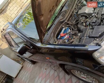 Черный Хонда СРВ, объемом двигателя 2 л и пробегом 299 тыс. км за 4999 $, фото 2 на Automoto.ua