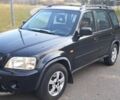 Черный Хонда СРВ, объемом двигателя 2 л и пробегом 250 тыс. км за 3300 $, фото 1 на Automoto.ua