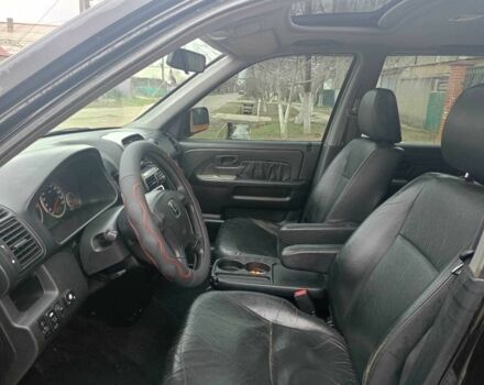 Черный Хонда СРВ, объемом двигателя 2 л и пробегом 335 тыс. км за 6500 $, фото 5 на Automoto.ua