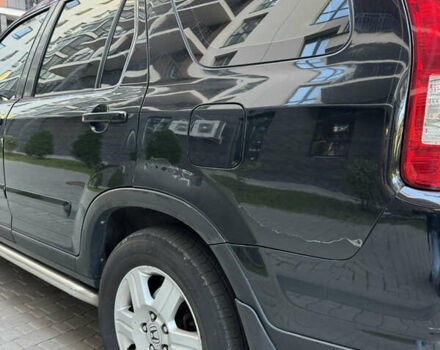 Чорний Хонда СРВ, об'ємом двигуна 2 л та пробігом 422 тис. км за 7599 $, фото 11 на Automoto.ua