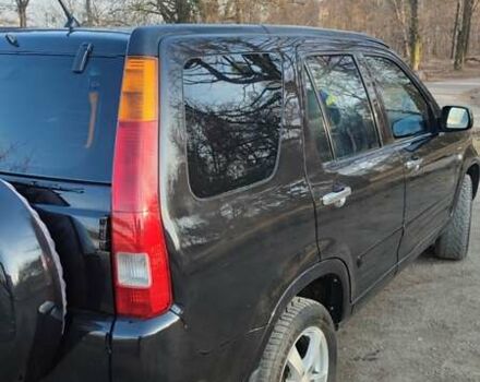 Чорний Хонда СРВ, об'ємом двигуна 2 л та пробігом 370 тис. км за 7300 $, фото 4 на Automoto.ua