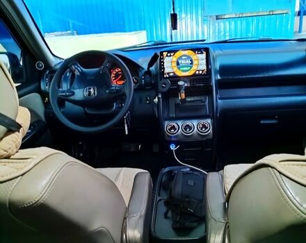 Чорний Хонда СРВ, об'ємом двигуна 2 л та пробігом 302 тис. км за 7400 $, фото 5 на Automoto.ua
