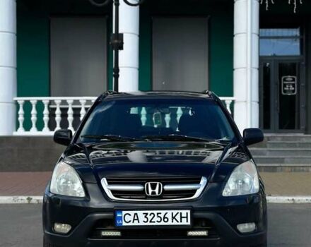 Черный Хонда СРВ, объемом двигателя 2 л и пробегом 250 тыс. км за 6800 $, фото 1 на Automoto.ua