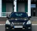 Черный Хонда СРВ, объемом двигателя 2 л и пробегом 250 тыс. км за 6800 $, фото 1 на Automoto.ua