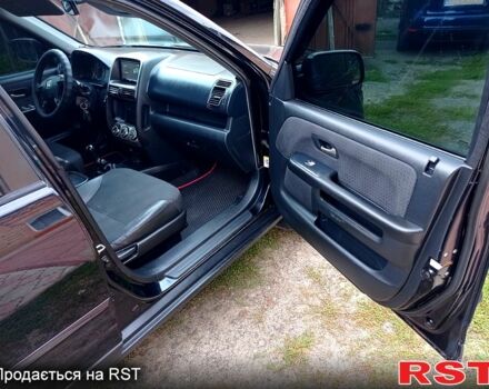 Чорний Хонда СРВ, об'ємом двигуна 2 л та пробігом 280 тис. км за 6850 $, фото 9 на Automoto.ua