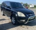 Черный Хонда СРВ, объемом двигателя 2 л и пробегом 290 тыс. км за 7100 $, фото 1 на Automoto.ua