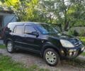 Черный Хонда СРВ, объемом двигателя 2 л и пробегом 235 тыс. км за 7740 $, фото 2 на Automoto.ua