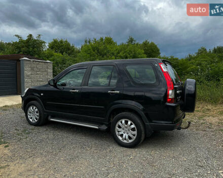 Черный Хонда СРВ, объемом двигателя 2.2 л и пробегом 429 тыс. км за 7700 $, фото 1 на Automoto.ua