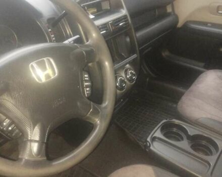 Чорний Хонда СРВ, об'ємом двигуна 2 л та пробігом 264 тис. км за 6700 $, фото 1 на Automoto.ua