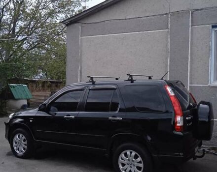 Черный Хонда СРВ, объемом двигателя 2 л и пробегом 271 тыс. км за 7400 $, фото 16 на Automoto.ua