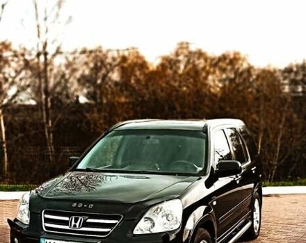 Черный Хонда СРВ, объемом двигателя 2 л и пробегом 186 тыс. км за 10000 $, фото 1 на Automoto.ua