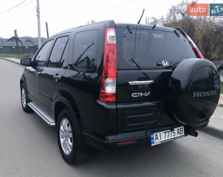 Чорний Хонда СРВ, об'ємом двигуна 2 л та пробігом 97 тис. км за 11200 $, фото 34 на Automoto.ua