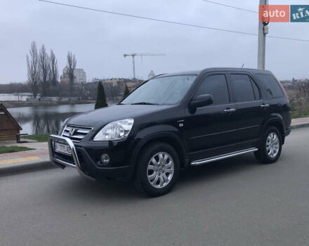 Чорний Хонда СРВ, об'ємом двигуна 2 л та пробігом 97 тис. км за 11200 $, фото 2 на Automoto.ua