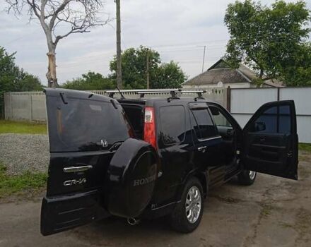 Черный Хонда СРВ, объемом двигателя 2 л и пробегом 271 тыс. км за 7400 $, фото 4 на Automoto.ua