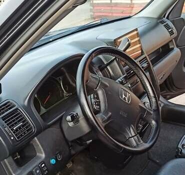 Черный Хонда СРВ, объемом двигателя 2 л и пробегом 186 тыс. км за 10000 $, фото 12 на Automoto.ua