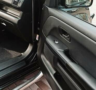 Черный Хонда СРВ, объемом двигателя 2 л и пробегом 186 тыс. км за 10000 $, фото 16 на Automoto.ua