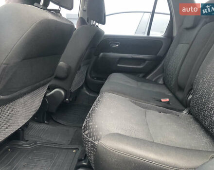 Чорний Хонда СРВ, об'ємом двигуна 2 л та пробігом 97 тис. км за 11200 $, фото 67 на Automoto.ua