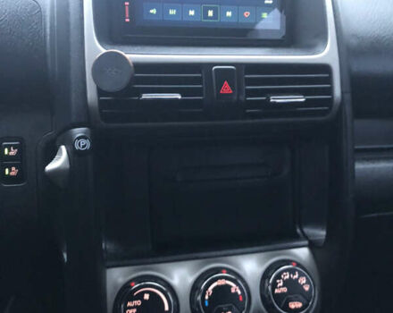 Чорний Хонда СРВ, об'ємом двигуна 2 л та пробігом 97 тис. км за 11200 $, фото 77 на Automoto.ua