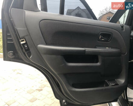 Чорний Хонда СРВ, об'ємом двигуна 2 л та пробігом 97 тис. км за 11200 $, фото 69 на Automoto.ua