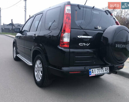 Чорний Хонда СРВ, об'ємом двигуна 2 л та пробігом 97 тис. км за 11200 $, фото 35 на Automoto.ua