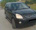 Черный Хонда СРВ, объемом двигателя 2.2 л и пробегом 302 тыс. км за 4600 $, фото 1 на Automoto.ua