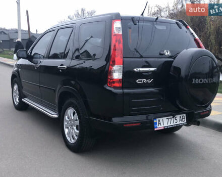 Чорний Хонда СРВ, об'ємом двигуна 2 л та пробігом 97 тис. км за 11200 $, фото 9 на Automoto.ua