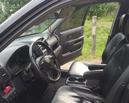 Черный Хонда СРВ, объемом двигателя 2 л и пробегом 271 тыс. км за 7400 $, фото 2 на Automoto.ua