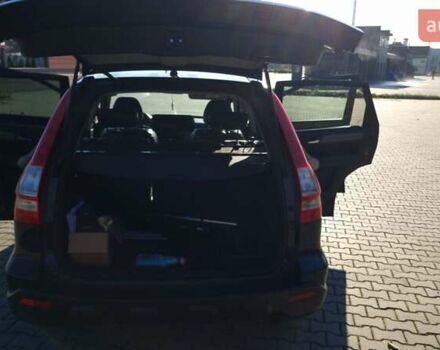 Черный Хонда СРВ, объемом двигателя 2.2 л и пробегом 310 тыс. км за 10950 $, фото 1 на Automoto.ua